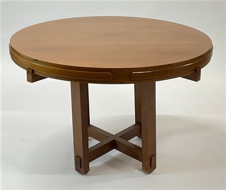 Tavolo con piano circolare in legno massello impiallacciato con gambe riunite d