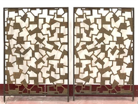 Liliana Grassi Due copricaloriferi in bronzo decorato a motivi astratti geometri