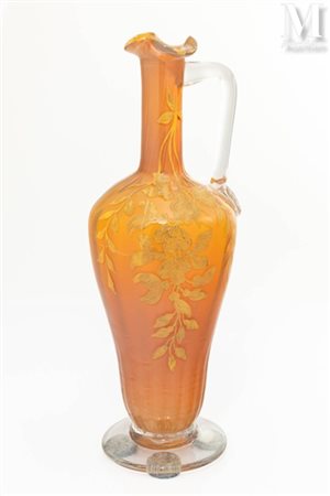 Travail Art Nouveau Aiguière en verre transparent et teinté orange-ambré à...