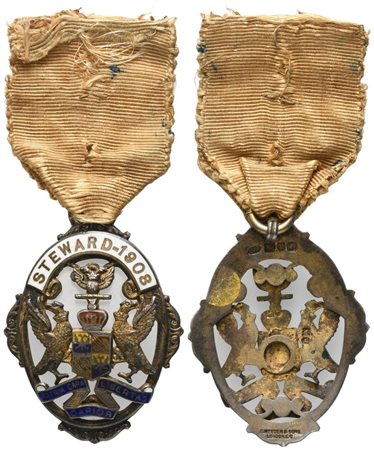  
Medaglia STEWARD - 1908, "Patria Cara Carior Libertas", AG E Smalti (34 x 44 mm) 
 