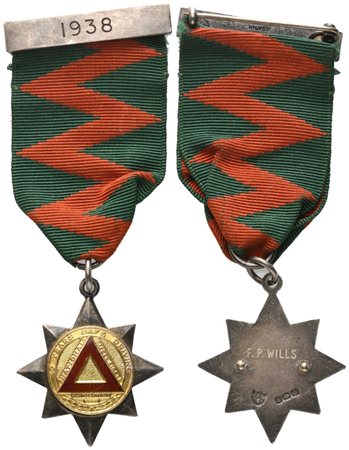  
Medaglia National Safety First Association, "10 years Safe Driving", 1938, AG E Smalti (32,5 x 94 mm) 
 