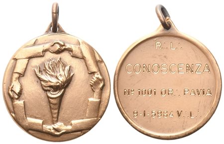  
Medaglia R. L. "Conoscenza" N° 1001 Or. Pavia, 9 - 1 - 5984 V. L. (30,7 mm) 
 