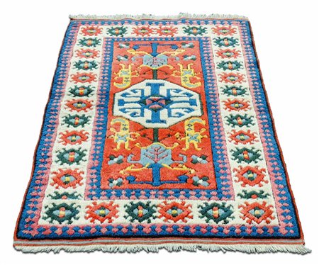 TAPPETO TURCO KARS - TURKISH KARS RUG fondo arancio, campo con medaglione...