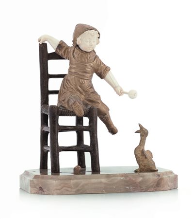 OMERTH GEORGES 1895 - 1925Bambina su sedia e ocaBronzo e avorio, base in...