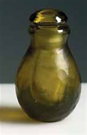 Venini. Piccola bottiglia portaprofumo in vetro battuto fumè, disegno di...