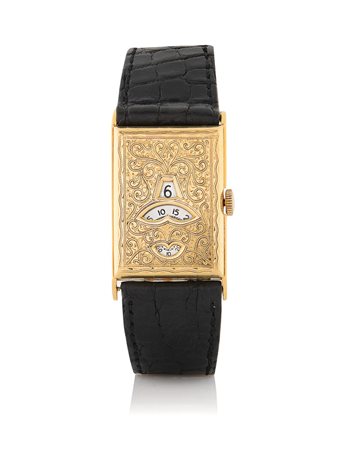 ANONIMOSALTARELLO ANNI '20. Cassa rettangolare in oro giallo 18 kt con fronte...