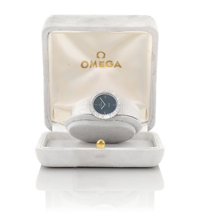 OMEGAOMEGA LADY ANNI '60.Cassa in oro bianco 18 kt con lunetta in brillanti...