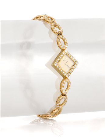 ETERNA ETERNA ANNI '60. Cassa romboidale in oro giallo 18 kt con lunetta in...