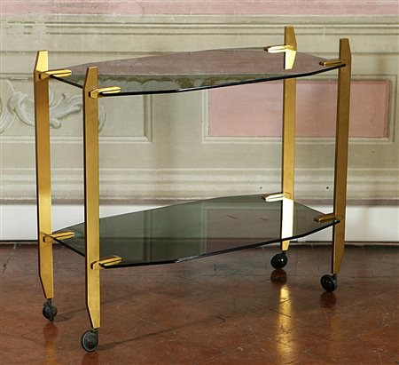 ANONIMO. Carrello in metallo ramato,ripiani in vetro fumé. Cart in copper...
