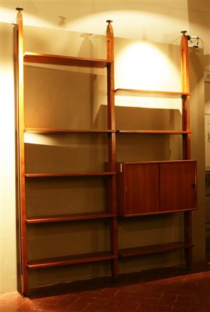 Importante libreria a tre montanti. Important library. Legno di teak. Cm...