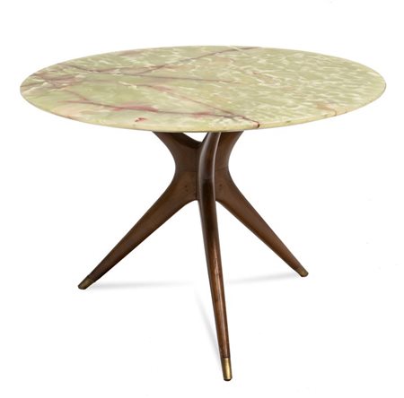 DE CARLI CARLO Tavolo in legno di noce, piano in onice e puntali in ottone....