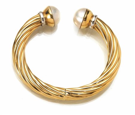 Bracciale in oro giallo, oro bianco e perle mabea cerchio rigido in oro...