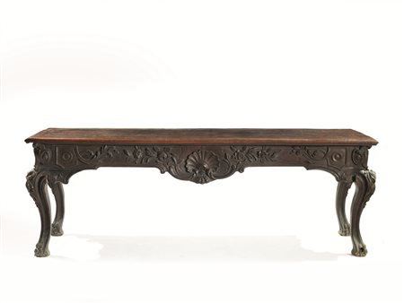 Grande tavolo a muro, Roma, inizi sec. XVIIIin noce a patina scura intarsiato...