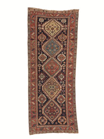 TAPPETO SCIRVAN CAUCASO, META' SECOLO XIXfondo blu con medaglioni gialli,...