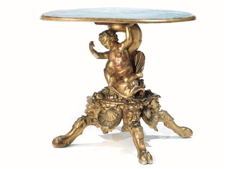TAVOLO, SECONDA METÀ SEC. XIXin legno scolpito e dorato, con piano circolare...