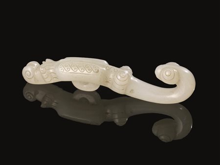 DUE INTAGLI, CINA, SEC. XXin giada verde pallido, uno nella forma di piccolo...