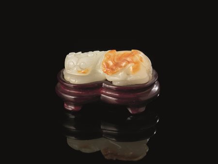 TRE BUDDHA E DUE ANIMALI, CINA, SEC. XXin pietre dure varie il pi&ugrave;...