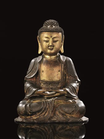 BUDDHA CINA DINASTIA MING SEC. XVI-XVIIin bronzo dorato, la figura assisa in...
