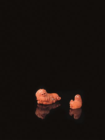 DUE INTAGLI, CINA, SEC. XXin corallo, uno modellato a gallo e uno a guisa di...