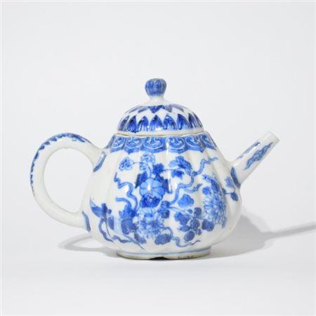 A small blue and white Chinese teapot