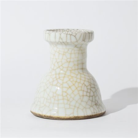 A Chinese Guan porcelain altar stick holder