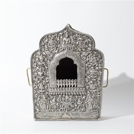 A fine Tibetan silver Gau