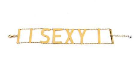 Bracciale in oro in oro giallo 18k, con inserimento di lettere a formare la...