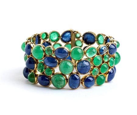 Bracciale in oro con smeraldi e zaffiri Francia, anni '50 Appartenuto alla...