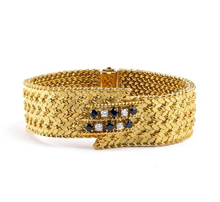 Bracciale in oro con diamanti e zaffiri motivo a nastro a maglia intrecciata...
