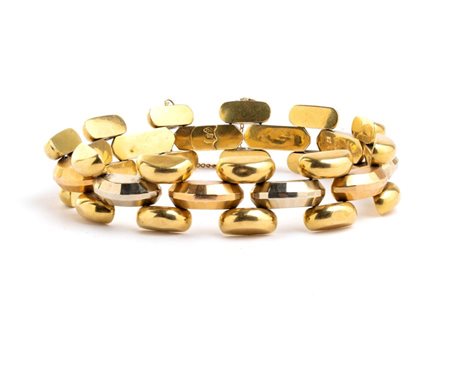 Bracciale in oro Anni '40 modello tank, in oro giallo, bianco e rosa 18k....