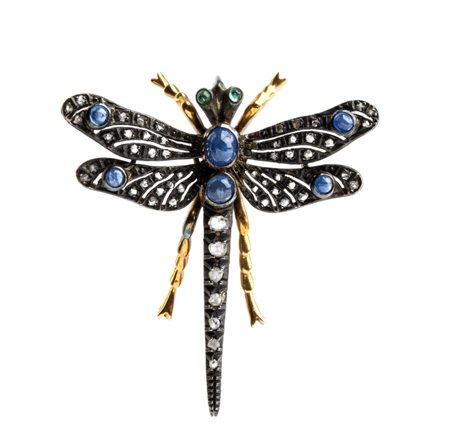 Spilla in oro e argento con diamanti, smeraldi e zaffiri inizio XX secolo in...