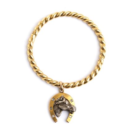 Bracciale in oro con pendente in oro giallo 18k, a cerchio rigido con motivo...