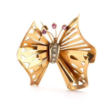 Spilla in oro, rubini e diamanti Anni '40 in oro giallo e d oro bianco, a...