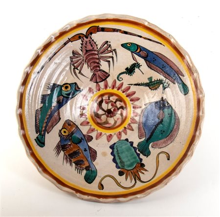 RICHARD DÖLKER
(Schönberg 1896 - Kohlgraben 1955)
<br>Grande piatto con decorazione di pesci e molluschi