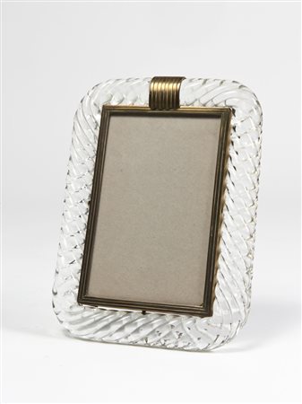 Venini. Cornice portafoto in vetro trasparente lavorato a treccia. Murano,...