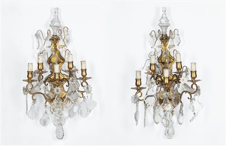 Coppia  di appliques a cinque fiamme in bronzo dorato e cristalli molati, secolo XIX