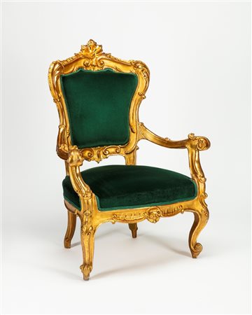 Poltrona in legno intagliato e dorato, secolo XIX.