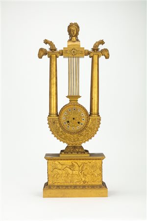 Pendola a lira in bronzo dorato. Francia, circa 1880