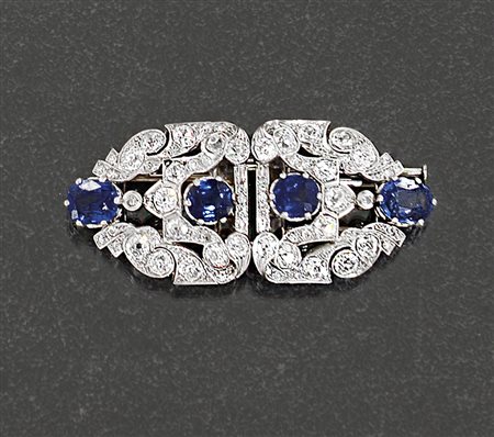 SPILLA SPILLA-DOPPIA CLIP ANNI '40 CA. In platino con zaffiri taglio ovale...