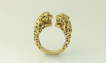 ANELLO ANELLO DI CARTIER. In oro giallo 18 kt realizzato a due pantere...