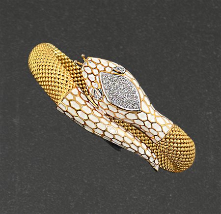 BRACCIALE BRACCIALE. In oro giallo e bianco 9 kt a serpente, maglia tubolare...