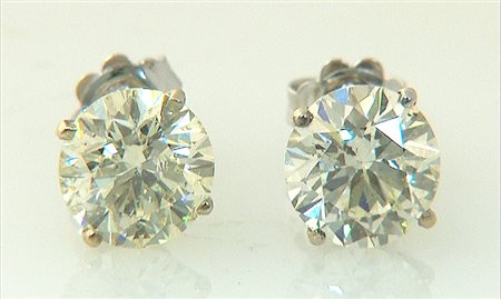 ORECCHINI COPPIA DI ORECCHINI. In oro bianco 18 kt perno e farfalla con due...