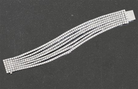 BRACCIALE BRACCIALE. In oro bianco 18 kt a sette fili tennis interamente...