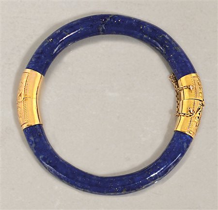 BRACCIALE BRACCIALE. In lapislazzulo con inserti in oro giallo 14 kt decorati...