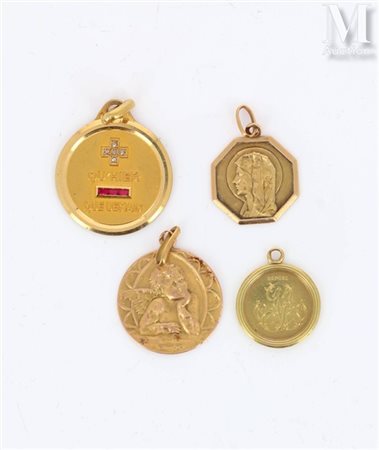 Médailles Ensemble de médailles en or jaune 18k (750 millièmes) comprenant...