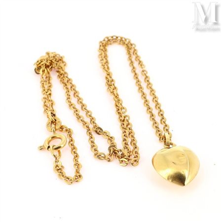 Ensemble Ensemble en or jaune 18k (750 millièmes) comprenant une chaîne de...