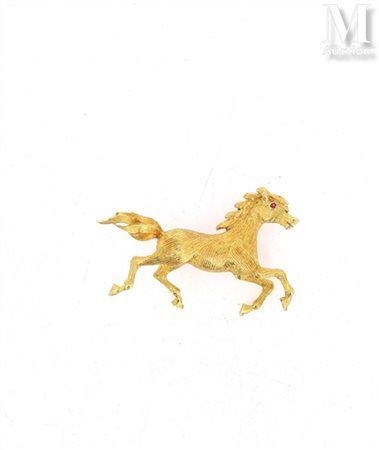 Broche cheval Broche en or jaune 18k (760 millièmes) figurant un cheval au...