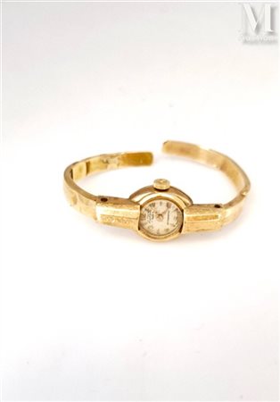 Montre baguette Montre baguette en or jaune 18K (750 millièmes), cadran rond...