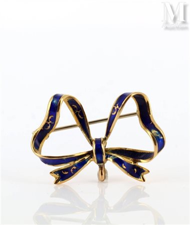 Broche nud Broche en or jaune 18k (750 millièmes) figurant un nud émaillé...