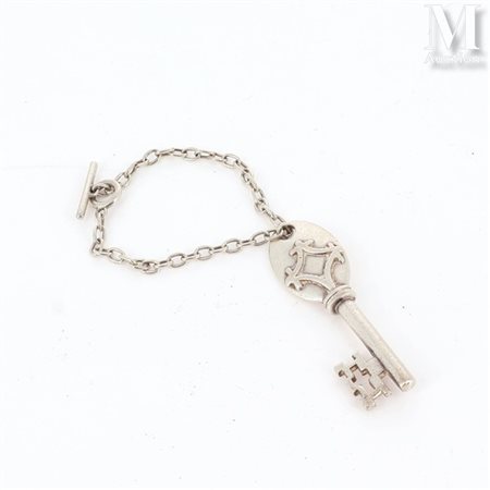 ROLEX Porte clé en argent (925 millièmes) figurant une clé. Signé. Poids:...